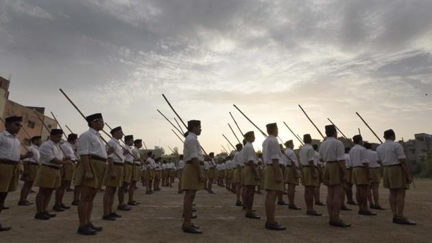 Participants at an RSS camp in New Delhi. Though the RSS maintains it is apolitical, there was convergence between its cadre and the BJP on how to breach the bastions and reach out to people in northeastern states.(HT file photo) Participants at an RSS camp in New Delhi. Though the RSS maintains it is apolitical, there was convergence between its cadre and the BJP on how to breach the bastions and reach out to people in northeastern states.(HT file photo)