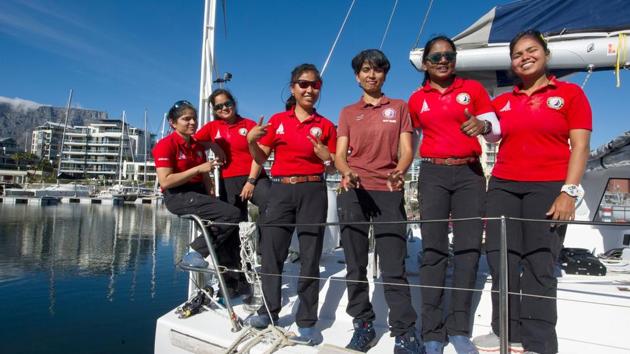 In this photo supplied by Networx PR, crew of the INSV Tarini vessel pose on deck for a photograph after their arrival in Cape Town Harbour, South Africa Friday, March 3, 2018.(AP Photo)