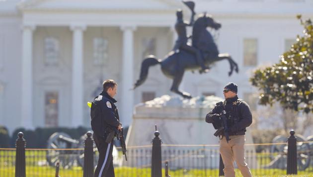 Law enforcement officers at Lafayette Park across from the White House in Washington. (AP Photo)