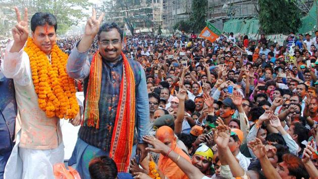 BJP national general secretary Ram Madhav and Tripura BJP chief Biplab Kumar Deb display victory signs as they celebrate with supporters in Agartala.(PTI Photo) BJP national general secretary Ram Madhav and Tripura BJP chief Biplab Kumar Deb display victory signs as they celebrate with supporters in Agartala.(PTI Photo)
