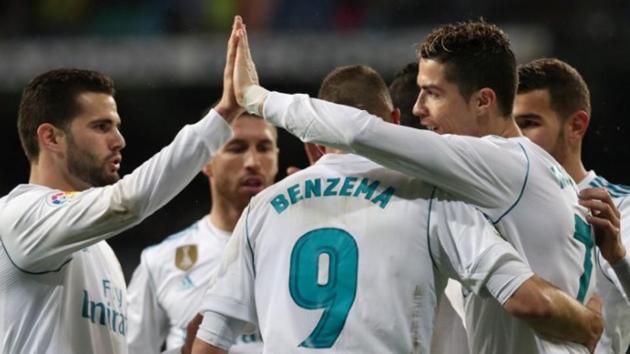 Real Madrid’s Cristiano Ronaldo celebrates scoring their second goal with team mates during the La Liga game against Getafe.(Reuters)