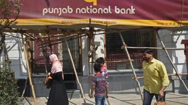 People walk past as CBI team seals Punjab National Bank’s South Mumbai branch at Brady House in Mumbai last month. (PTI File Photo) People walk past as CBI team seals Punjab National Bank’s South Mumbai branch at Brady House in Mumbai last month. (PTI File Photo)
