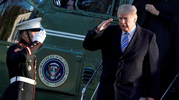 US President Donald Trump salutes as he returns to the White House in Washington, from Palm Beach. (Reuters Photo) US President Donald Trump salutes as he returns to the White House in Washington, from Palm Beach. (Reuters Photo)