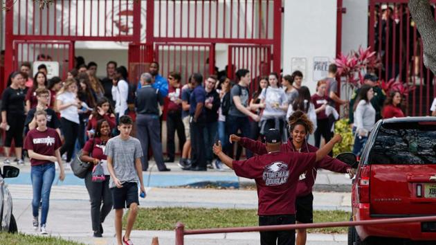 Marjory Stoneman Douglas High School students, staff and teachers exit the building following their return to school in Parkland, Florida on February 28, 2018. A former student, Nikolas Cruz, opened fire at Marjory Stoneman Douglas High School leaving 17 people dead and 15 injured on February 14. (AFP Photo) Marjory Stoneman Douglas High School students, staff and teachers exit the building following their return to school in Parkland, Florida on February 28, 2018. A former student, Nikolas Cruz, opened fire at Marjory Stoneman Douglas High School leaving 17 people dead and 15 injured on February 14. (AFP Photo)