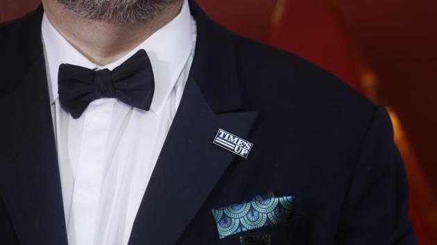 Best Director Nominee Guillermo del Toro wears a Times Up pin during the Oscar arrivals in California. There was no #MeToo or Time’s Up dress code on the Oscar red carpet. But the topic was a major talking point of the evening — and host Jimmy Kimmel got right to it in his opening monologue. “Here’s how clueless Hollywood is about women,” Kimmel said. “We made a movie called ‘What Women Want’ and it starred Mel Gibson.” (Carlo Allegri / REUTERS)