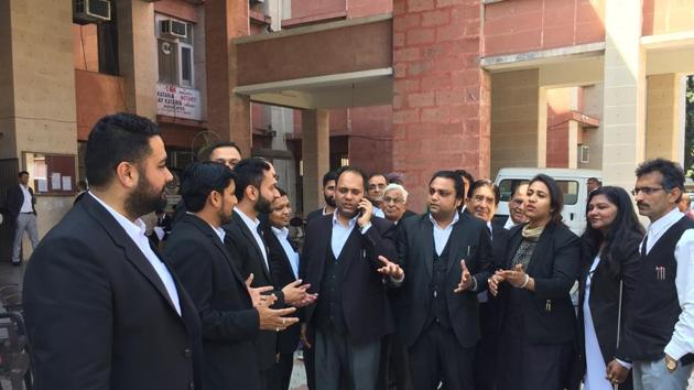 Protesting lawyers at the Chandigarh district courts in Sector 43 on Monday.(HT Photo)