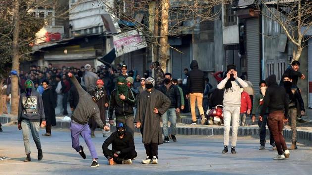Protesters throw stones at security forces during a demonstration against the killing of three civilians allegedly in Army firing in Shopian district on January 27. (PTI File Photo) Protesters throw stones at security forces during a demonstration against the killing of three civilians allegedly in Army firing in Shopian district on January 27. (PTI File Photo)