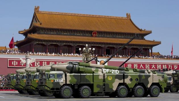 Chinese military vehicles carrying DF-21D anti-ship ballistic missiles, potentially capable of sinking a US Nimitz-class aircraft carrier in a single strike, drive past Tiananmen Gate during a military parade on September 3, 2015. (AP File Photo) Chinese military vehicles carrying DF-21D anti-ship ballistic missiles, potentially capable of sinking a US Nimitz-class aircraft carrier in a single strike, drive past Tiananmen Gate during a military parade on September 3, 2015. (AP File Photo)