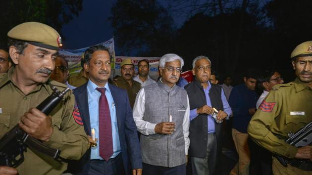 Delhi Chief Secretary Anshu Prakash leads a candle light march from Delhi Secretariat to Rajghat over the alleged assault on him by AAP MLAs. (PTI Photo) Delhi Chief Secretary Anshu Prakash leads a candle light march from Delhi Secretariat to Rajghat over the alleged assault on him by AAP MLAs. (PTI Photo)