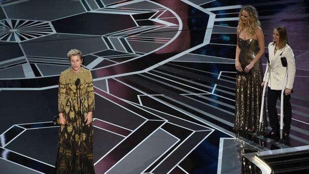 Frances McDormand accepts the award for best performance by an actress in a leading role for ‘Three Billboards Outside Ebbing, Missouri’ as Jennifer Lawrence and Jodie Foster look on from right at the Oscars. The 90th Academy Awards kicked off at the Dolby Theatre in Hollywood on Monday. Guillermo del Toro’s romance fantasy The Shape of Water led nominations with 13 nods, followed by eight nominations for Christopher Nolan’s epic World War II film, Dunkirk. (Chris Pizzello/Invision/AP)