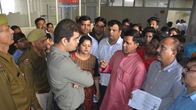 The aggrieved parents and students on Monday arrived at the office of the Ghaziabad district magistrate for help. They said that their school has asked them to get their admit cards from another school. But that school refused to grant them admit cards. (Sakib Ali/HT Photo) The aggrieved parents and students on Monday arrived at the office of the Ghaziabad district magistrate for help. They said that their school has asked them to get their admit cards from another school. But that school refused to grant them admit cards. (Sakib Ali/HT Photo)
