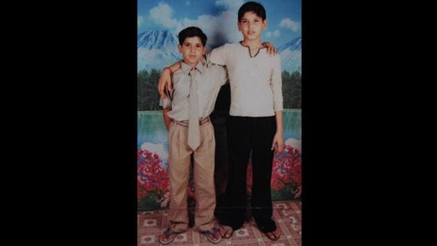 Akaksh (R) in a 2007 photo with his brother Sumit. The feud between Abhishek and Akash was over a girl Sumit maintains. With few having heard of school shootings in India, conversation soon revolved around the effects of “new, property-driven wealth” and “modernity” on the minds of these children. On December 11, 2007 the court sent Akash to Faridabad’s juvenile observation home for three years. (HT Photo) 
