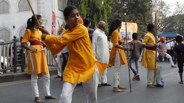 Children perform martial arts on the occasion of Shiv Jayanthi, celebrated according to the Marathi calendar, at Nana peth on Sunday. (rahul raut/ht photo) 