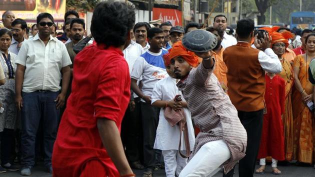 A martial art performance on the occasion of Shiv Jayanthi celebrations at Nana peth on Sunday. (rahul raut/ht photo) 