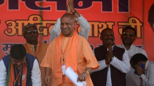Chief minister of Uttar Pradesh, Yogi Adityanath looks on towards a crowd during a public meeting for BJP's candidate Kaushlendra Singh Patel for the bypoll to Phulpur (Allahabad) Lok Sabha seat in Allahabad on March 4. (AFP Photo) Chief minister of Uttar Pradesh, Yogi Adityanath looks on towards a crowd during a public meeting for BJP's candidate Kaushlendra Singh Patel for the bypoll to Phulpur (Allahabad) Lok Sabha seat in Allahabad on March 4. (AFP Photo)