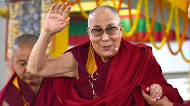 Tibetan spiritual leader the Dalai Lama greets schools students at an event in Bodhgaya.(AFP File Photo)