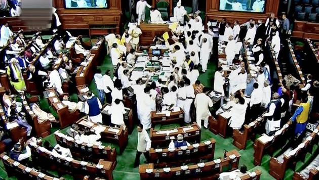 Opposition members protest during the ongoing budget session of Parliament at the Lok Sabha in New Delhi on March 5. (PTI Photo) Opposition members protest during the ongoing budget session of Parliament at the Lok Sabha in New Delhi on March 5. (PTI Photo)