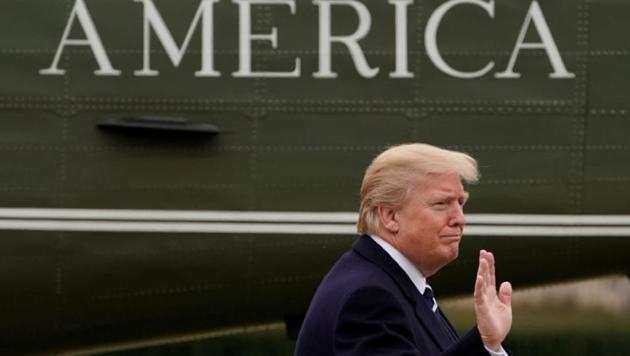 President Donald Trump walks on the South Lawn after returning to the White House, February 1.  Revoking the work permits is expected to regulate high-skilled immigration as Trump pushes his ‘America First’ agenda. (Reuters File)