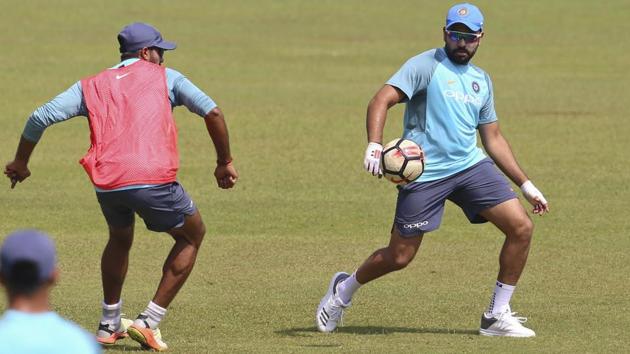 India's captain Rohit Sharma (R) warms up during a training session ahead of the tri-nation Twenty20 cricket series in Colombo, Sri Lanka on Monday, March 5, 2018. The Twenty20 tri-series that features Bangladesh, India and Sri Lanka begins on March 6. (AP) India's captain Rohit Sharma (R) warms up during a training session ahead of the tri-nation Twenty20 cricket series in Colombo, Sri Lanka on Monday, March 5, 2018. The Twenty20 tri-series that features Bangladesh, India and Sri Lanka begins on March 6. (AP)