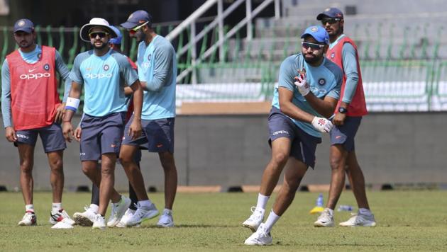 India's captain Rohit Sharma (2R) participates in a fielding practice session ahead of the tri-nation Twenty20 cricket series in Colombo, Sri Lanka on Monday, March 5, 2018. The Twenty20 tri-series that features Bangladesh, India and Sri Lanka begins on March 6. (AP) India's captain Rohit Sharma (2R) participates in a fielding practice session ahead of the tri-nation Twenty20 cricket series in Colombo, Sri Lanka on Monday, March 5, 2018. The Twenty20 tri-series that features Bangladesh, India and Sri Lanka begins on March 6. (AP)