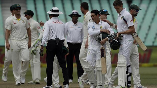South Africa's batsman Quinton de Kock‚ fourth right, and teammate Morne Morkel‚ second right, at the end of the fifth and final day of the first Test between South Africa and Australia at Kingsmead stadium in Durban. (AP) South Africa's batsman Quinton de Kock‚ fourth right, and teammate Morne Morkel‚ second right, at the end of the fifth and final day of the first Test between South Africa and Australia at Kingsmead stadium in Durban. (AP)