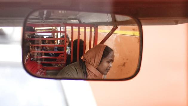 With the help of a loan, Binota bought an electric rickshaw for which she pays an monthly instalment of  Rs 2,200. Driving from 7 a.m onwards in two shifts, she  manages to earn 700 rupees a day. Binota said, “Before, we used to wait for the month’s end to receive payment, but with this profession money comes in daily and life has become much easier.” (Burhaan Kinu / HT Photo) 