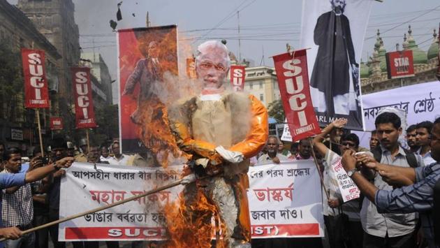 Socialist Unity Centre of India organised a protest rally in Kolkata against the demolition of Lenin’s statue in Tripura. Section 144 was imposed in some areas of Tripura as clashes broke out between supporters and party workers of the BJP and CPM after a statute of Vladimir Lenin was razed in Belonia. A victory procession was reportedly being carried out by the BJP when a group broke out and directed the bulldozer to the statue. (Samir Jana / HT Photo) Socialist Unity Centre of India organised a protest rally in Kolkata against the demolition of Lenin’s statue in Tripura. Section 144 was imposed in some areas of Tripura as clashes broke out between supporters and party workers of the BJP and CPM after a statute of Vladimir Lenin was razed in Belonia. A victory procession was reportedly being carried out by the BJP when a group broke out and directed the bulldozer to the statue. (Samir Jana / HT Photo)