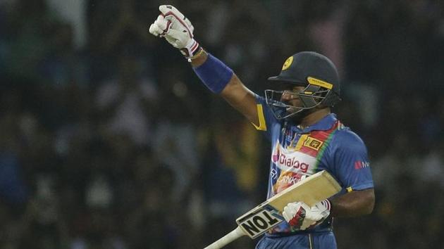 Sri Lanka’s Kusal Perera celebrates scoring a half-century against India during their T20 cricket match in Nidahas Trophy in Colombo. Follow full cricket score of India vs Sri Lanka, 1st T20, Nidahas Trophy 2018 here(AP)