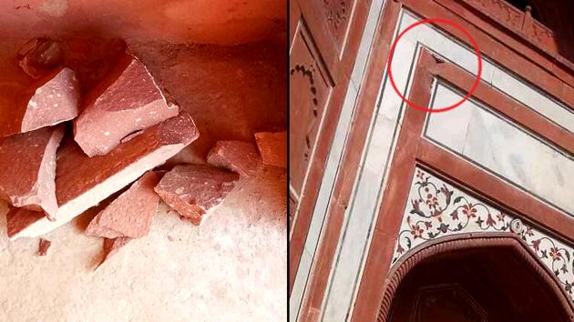 Red sandstone pieces which fell from a corner of the Taj Mahal’s royal gate.(HT PHOTO)