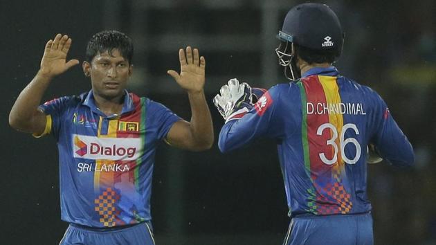 Sri Lanka's Jeevan Mendis, left, celebrates after taking the wicket of India's Manish Pandey. (AP) Sri Lanka's Jeevan Mendis, left, celebrates after taking the wicket of India's Manish Pandey. (AP)