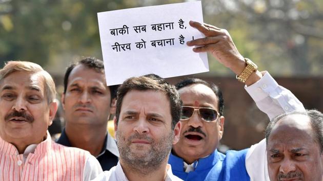 Congress president Rahul Gandhi and Party leaders protest outside Parliament during second phase of Budget Session in New Delhi on Tuesday. (PTI Photo) Congress president Rahul Gandhi and Party leaders protest outside Parliament during second phase of Budget Session in New Delhi on Tuesday. (PTI Photo)