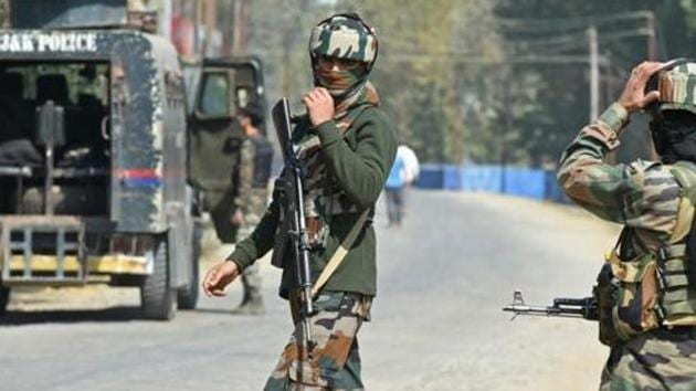 Paramilitary troopers stands guard after a gunfight with militants in north of Srinagar last October. (AFP File Photo) Paramilitary troopers stands guard after a gunfight with militants in north of Srinagar last October. (AFP File Photo)