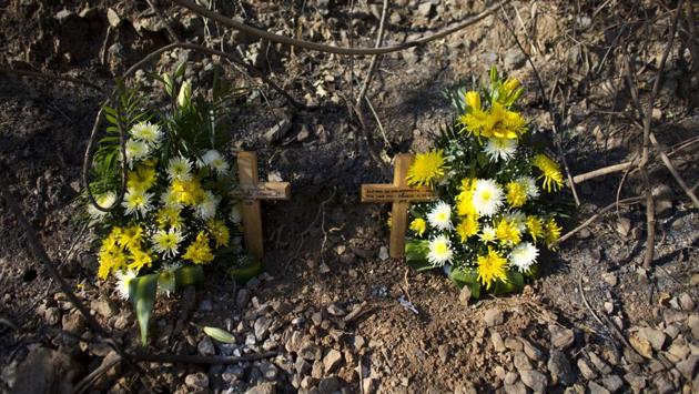 Vigilantism can be a deadly job. Crosses mark the spot where four members of a vigilante force died when their car was ambushed and burned near Rincon de la Via. And civilians die at the vigilantes’ hands as well. Alexis Estrada Asencio, a 17-year-old bull-riding enthusiast, and five others were killed in La Concepcion caught in a confused gunfight between vigilante forces and townsfolk over a proposed hydro-electric dam. (Rebecca Blackwell / AP)