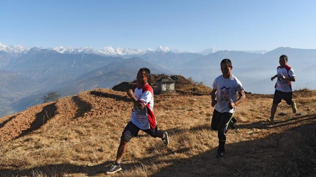 Mingma Lama, a fellow sprinter from the group who was sent to the monastery when he was eight but had to return to his village after the monastery was destroyed in the 2015 earthquake said, “Every day we go up and down the hills. We often have to walk far... So running wasn’t too hard for us.” (Paavan Mathema / AFP)