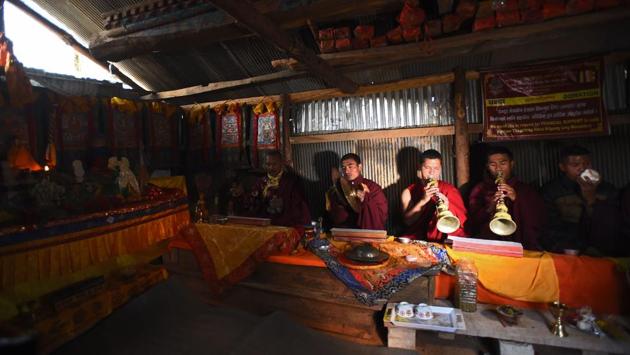 The monks perform morning prayers at their monastery before a training session. Life is tough in Sindhukot village, which lies just 80 kilometres from Kathmandu, but like many rural communities in Nepal feels totally cut off from the rest of the world. The nearest school is a two-hour walk and the only shops are in a neighbouring village. (Paavan Mathema / AFP)