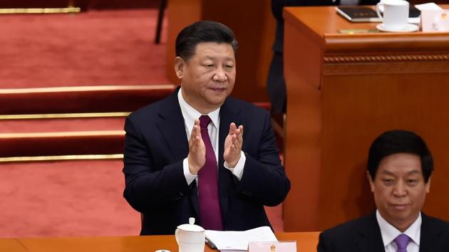President Xi Jinping applauds during the opening session of the National People's Congress, China's legislature, at the Great Hall of the People in Beijing on March 5, 2018.(AFP) President Xi Jinping applauds during the opening session of the National People's Congress, China's legislature, at the Great Hall of the People in Beijing on March 5, 2018.(AFP)