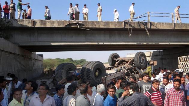 As many as 28 people died and 35 others were injured when a truck carrying wedding guests and family fell off a bridge in Gujarat’s Ranghona village in Bhavnagar district early on Tuesday. The vehicle going from Palitana to Botad fell off the bridge into the dry river bed of Ranghona river. (PTI) As many as 28 people died and 35 others were injured when a truck carrying wedding guests and family fell off a bridge in Gujarat’s Ranghona village in Bhavnagar district early on Tuesday. The vehicle going from Palitana to Botad fell off the bridge into the dry river bed of Ranghona river. (PTI)