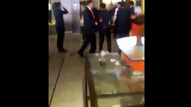Trouble broke out after they started eating from the buffet and were asked by the staff to go to their table as they had ordered paranthas from the à la carte menu. (Video Grab) Trouble broke out after they started eating from the buffet and were asked by the staff to go to their table as they had ordered paranthas from the à la carte menu. (Video Grab)