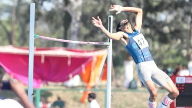 Tejaswin Shankar shattered his own national record of 2.26m while winning gold with an effort of 2.28m to book a Commonwealth Games berth during the Federation Cup National Senior Athletics Championships at the NIS Patiala on Wednesday. (HT Photo) Tejaswin Shankar shattered his own national record of 2.26m while winning gold with an effort of 2.28m to book a Commonwealth Games berth during the Federation Cup National Senior Athletics Championships at the NIS Patiala on Wednesday. (HT Photo)