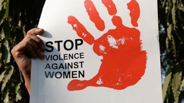 A social activist holding placards during a protest against a rape. (AFP File Photo) A social activist holding placards during a protest against a rape. (AFP File Photo)