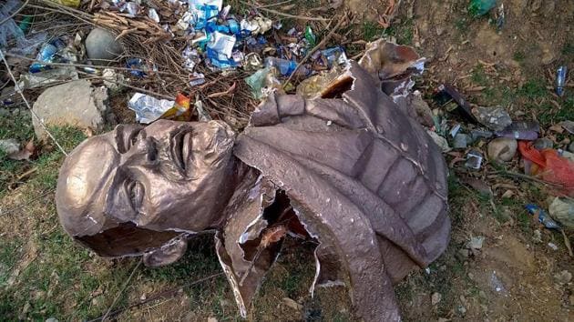 Remains of a five-feet statue of Lenin that was demolished by a payloader at Belonia in south Tripura district on Monday afternoon.(PTI Photo)