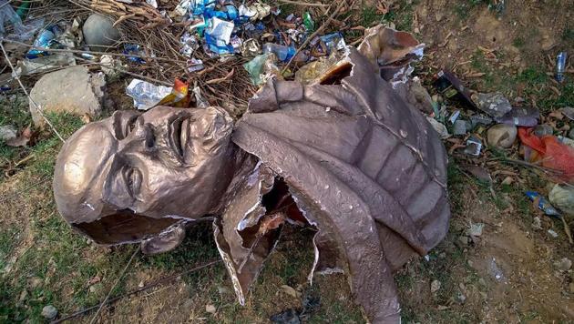 Remains of the five-feet-tall statue of Lenin which was allegedly demolished by a pay-loader at Belonia in South Tripura district on Monday afternoon(PTI) Remains of the five-feet-tall statue of Lenin which was allegedly demolished by a pay-loader at Belonia in South Tripura district on Monday afternoon(PTI)