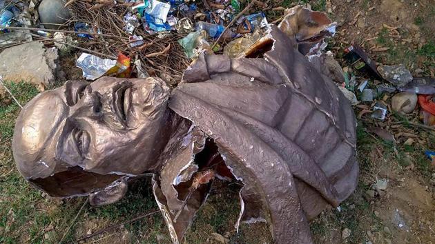 Remains of the five-feet-tall statue of Lenin which was allegedly demolished at Belonia in South Tripura district on Monday. (PTI Photo) Remains of the five-feet-tall statue of Lenin which was allegedly demolished at Belonia in South Tripura district on Monday. (PTI Photo)