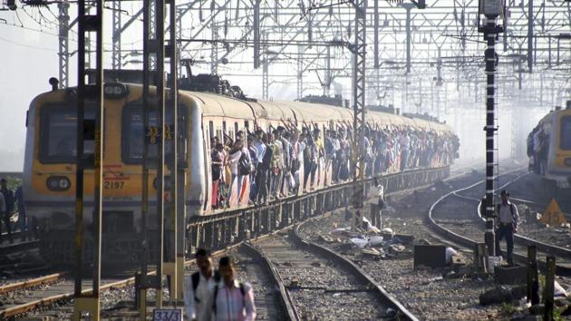 A local train arrives at a station in Mumbai. (PTI File Photo) A local train arrives at a station in Mumbai. (PTI File Photo)