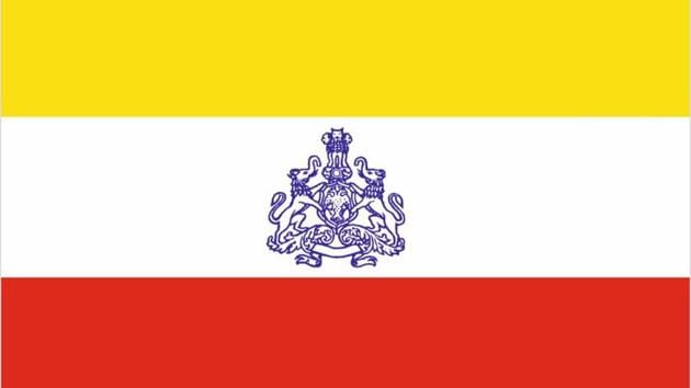 In a first, K'taka CM Siddaramaiah unveils Kannada flag, seeks Centre's  approval | In a first, K'taka CM Siddaramaiah unveils Kannada flag, seeks  Centre's approval