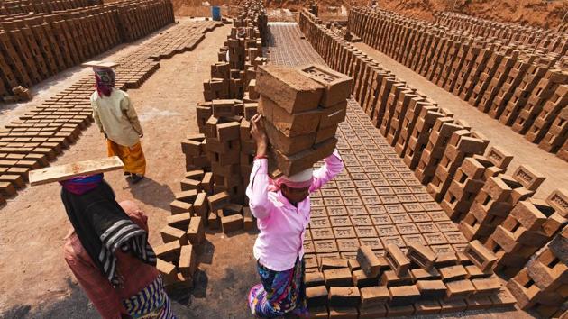 The women brick-kiln workers are often the invisible labourers who have to fight for their rights. (Pratham Gokhale/HT Photo) 