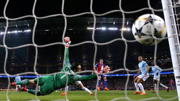 FC Basel’s Mohamed Elyounoussi scores their first goal against Manchester City in their UEFA Champions League round of 16 second leg match in Manchester on Wednesday. (Action Images via Reuters) FC Basel’s Mohamed Elyounoussi scores their first goal against Manchester City in their UEFA Champions League round of 16 second leg match in Manchester on Wednesday. (Action Images via Reuters)