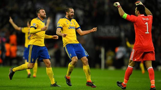 Juventus’ Giorgio Chiellini and Andrea Barzagli celebrate with Gianluigi Buffon after beating Tottenham Hotspur in the Champions League Round of 16 at Wembley Stadium in London on Wednesday. (Reuters) Juventus’ Giorgio Chiellini and Andrea Barzagli celebrate with Gianluigi Buffon after beating Tottenham Hotspur in the Champions League Round of 16 at Wembley Stadium in London on Wednesday. (Reuters)