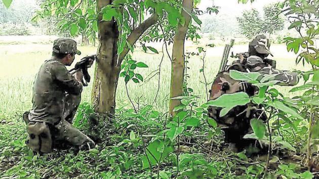 Security personnel in action against Maoists in an undisclosed location. (HT File) Security personnel in action against Maoists in an undisclosed location. (HT File)