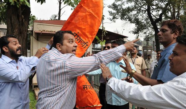 Members of the Brahman Mahasangh Ambhaji Brigade (L) argue after placing the photo of Dadoji Kondadev in PMC premises in Pune. (HT PHOTO) Members of the Brahman Mahasangh Ambhaji Brigade (L) argue after placing the photo of Dadoji Kondadev in PMC premises in Pune. (HT PHOTO)